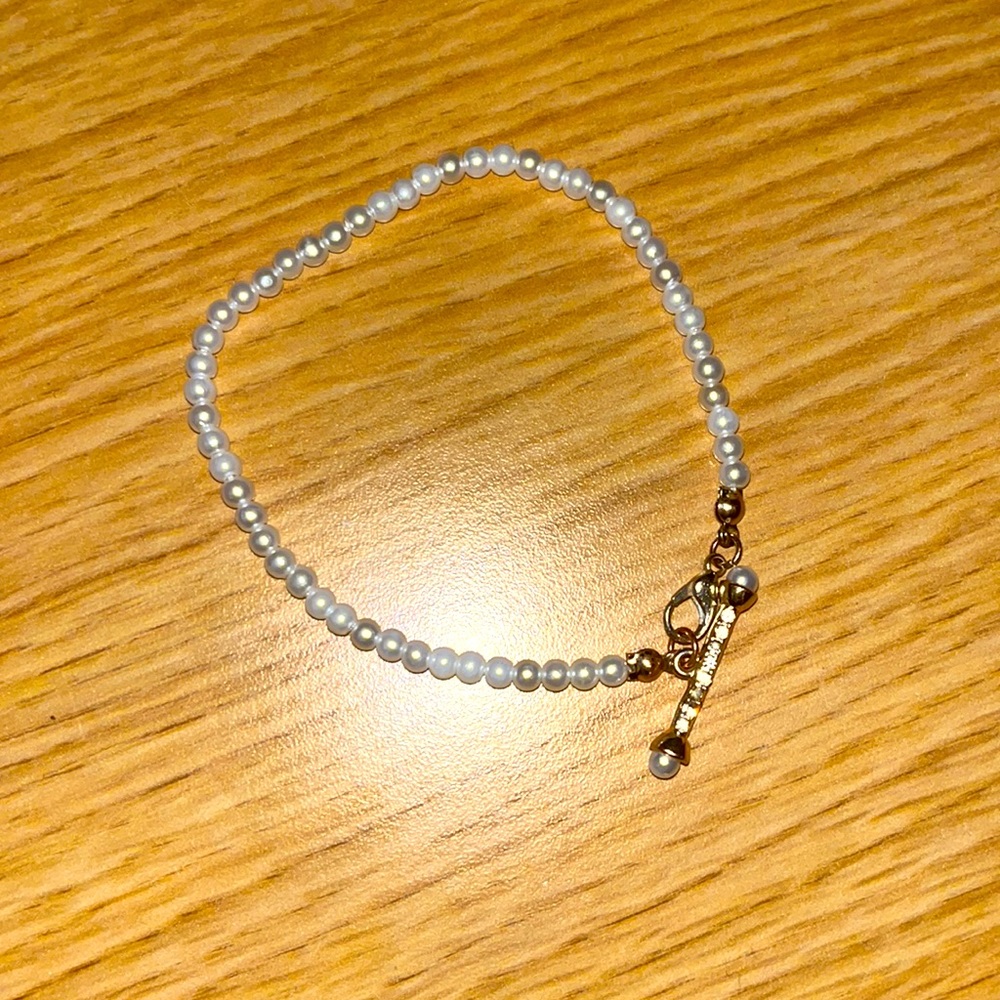 Pearl bracelet with diamond barbell lock made in Hawaii